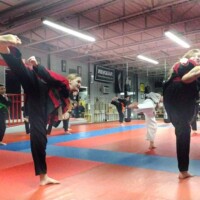 Students exercising in a kickboxing class
